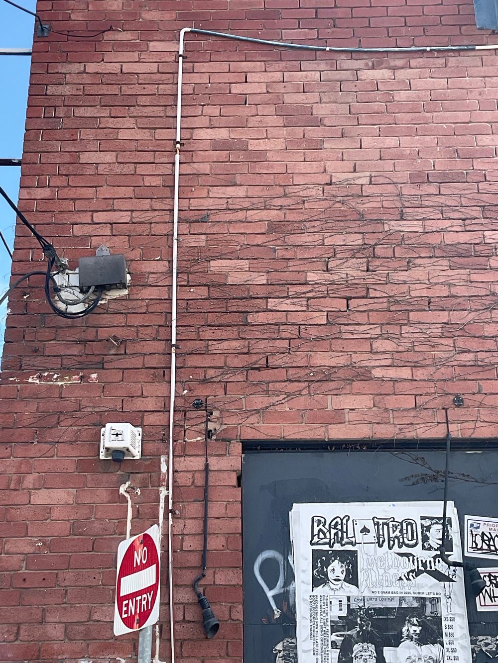 Step cracking running along the mortar joints of an external wall, found during a defect investigation inspection in Richmond