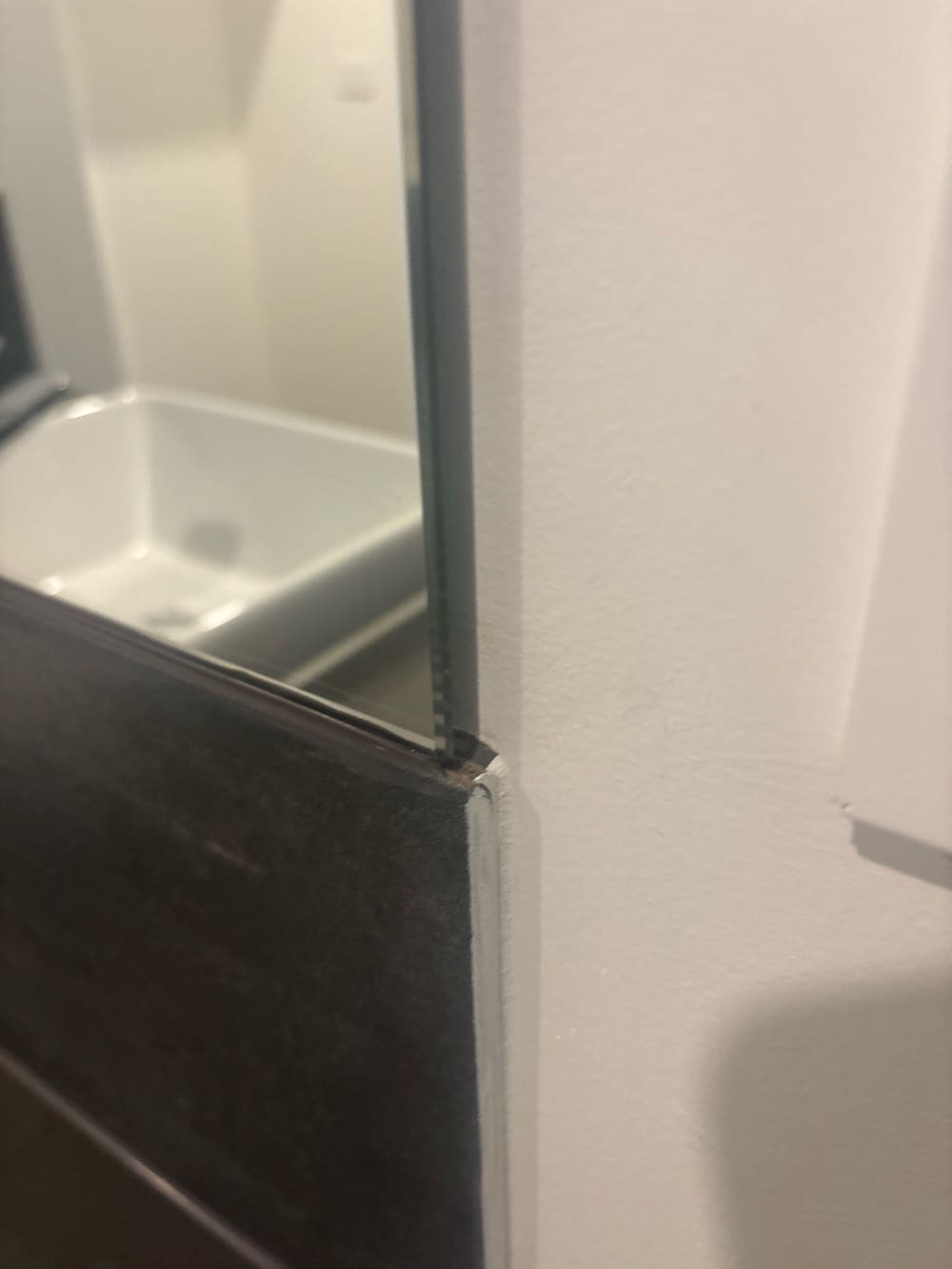 Mirror isn’t flush with flashback., recorded during a PCI inspection in Wyndham Vale