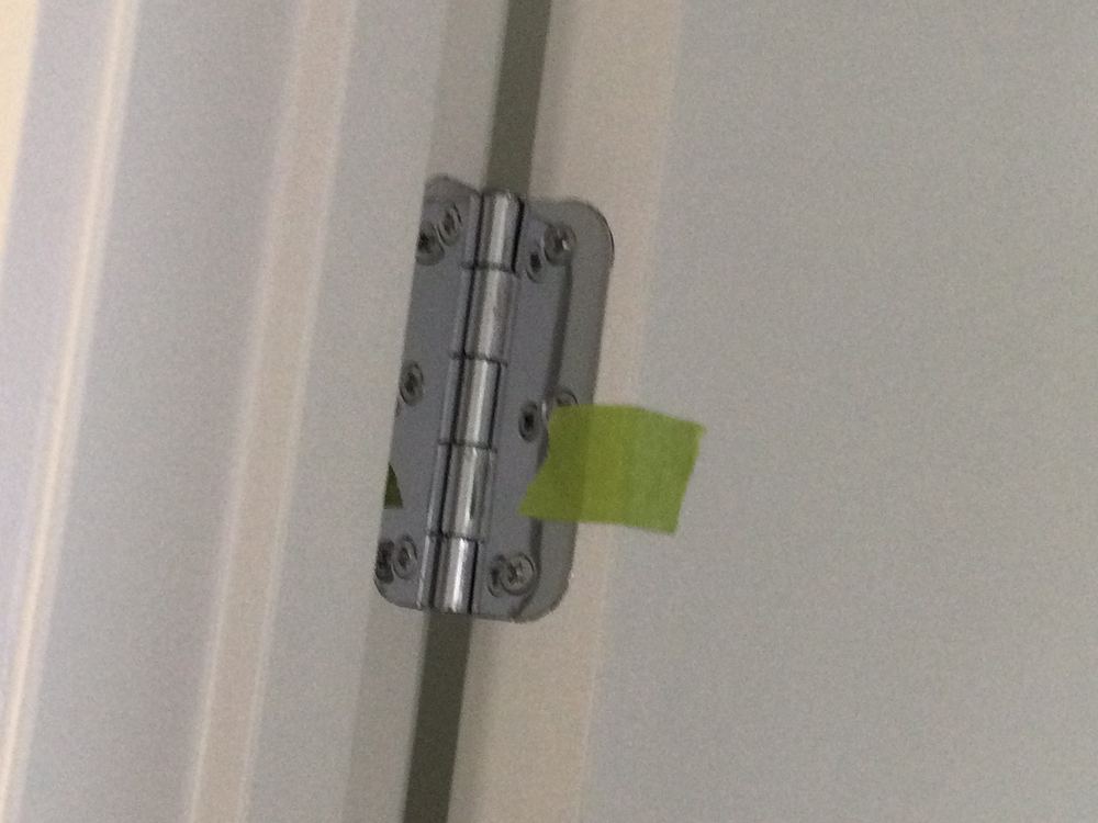 Powder room door still failing to latch at the reinspection, Wyndham Vale