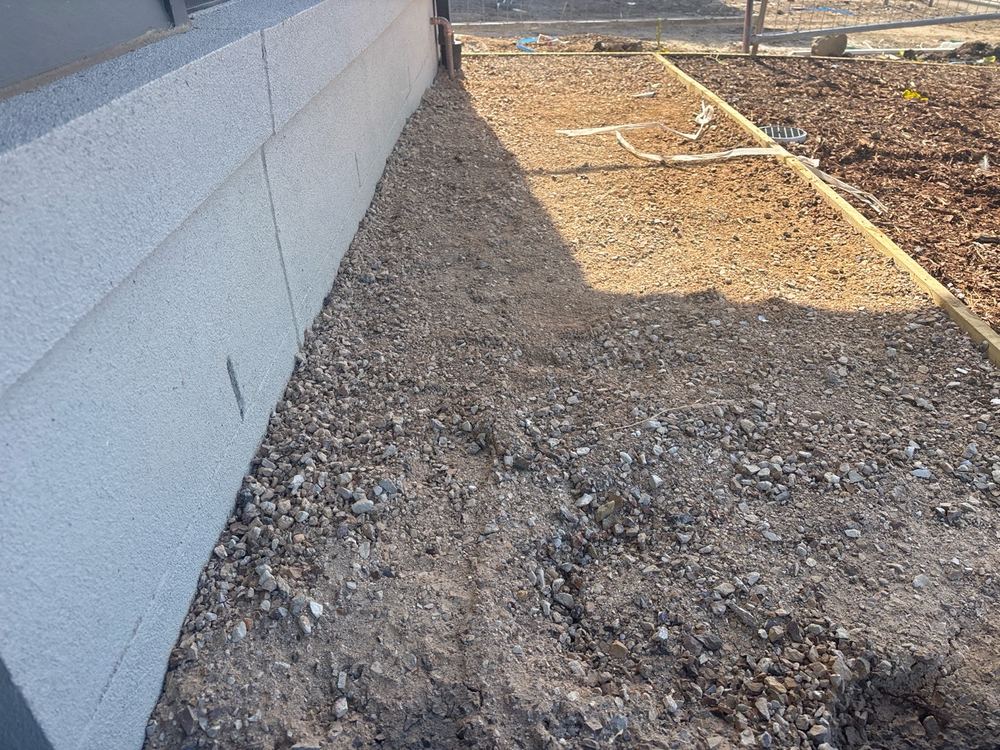 Site grading unfinished, so rain is not yet shed away from the slab, Wyndham Vale
