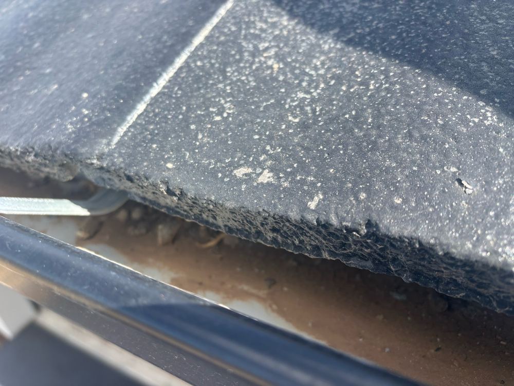 Construction debris left lying in the gutters, heading for the downpipes, Wyndham Vale