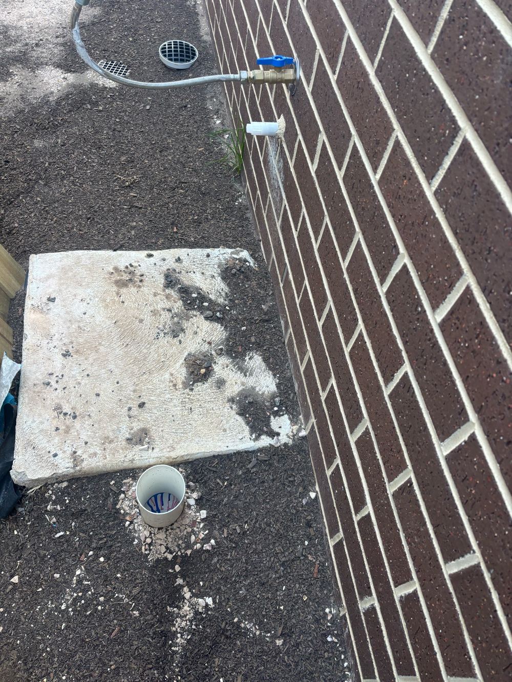 Stormwater pipe left uncapped and open to construction debris, found during a pre-handover inspection in Wyndham Vale