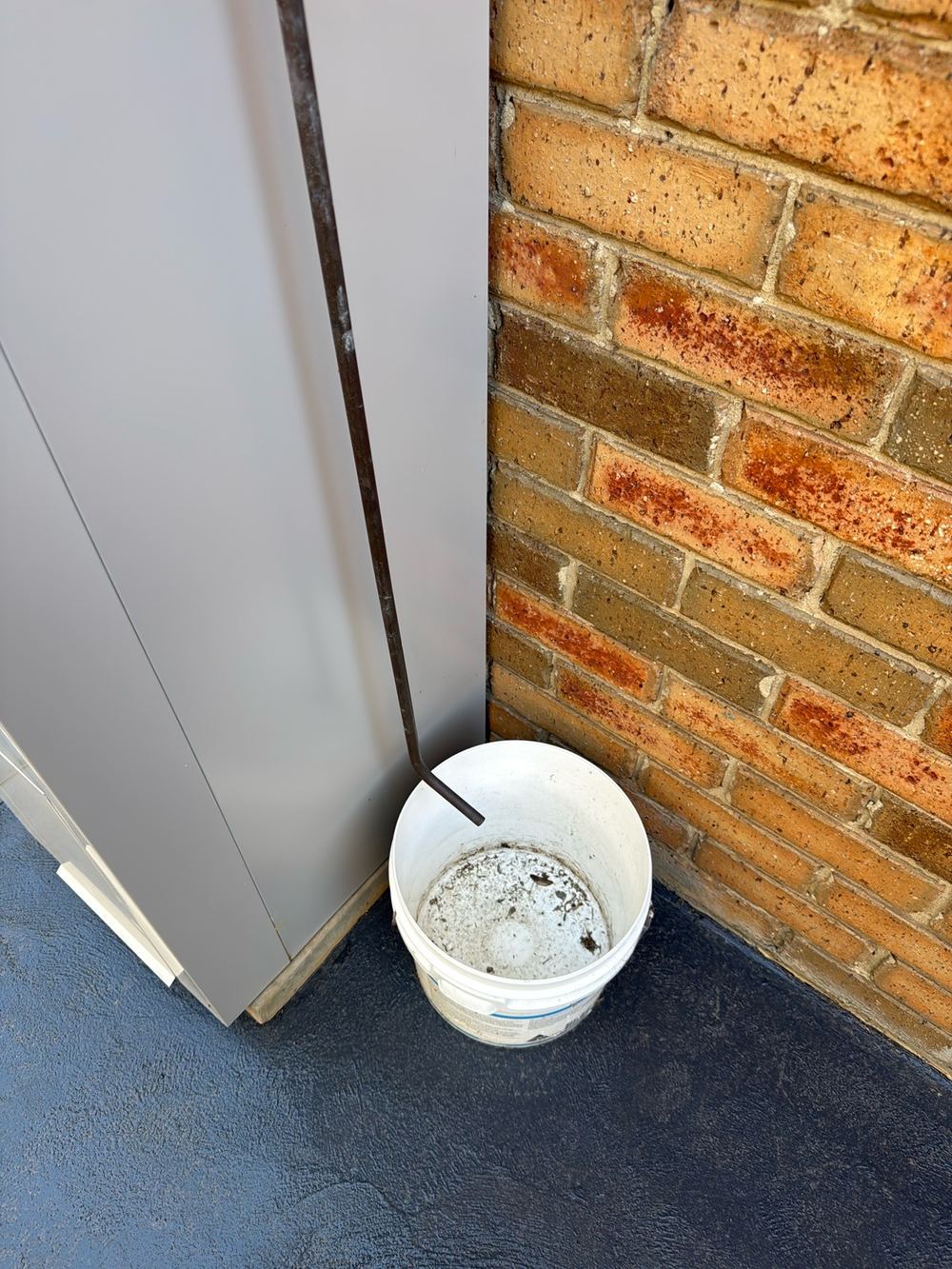Constant moisture beside the house, a condition that attracts termites, found during a pre-purchase inspection in Wantirna South