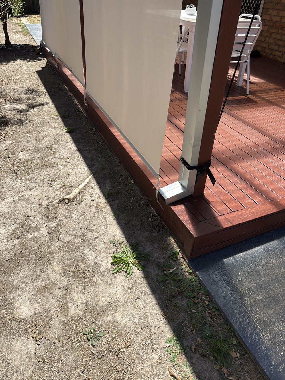 Downpipe discharging onto the ground rather than into stormwater, found during a pre-purchase inspection in Wantirna South