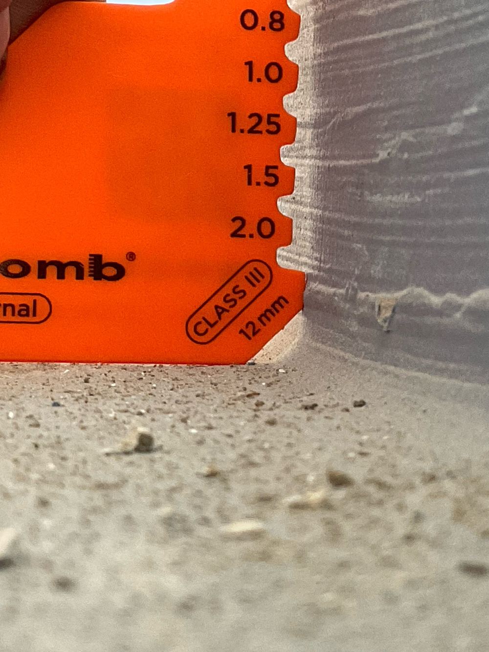 A second shower junction without the required bond breaker, found during a waterproofing inspection in Lara